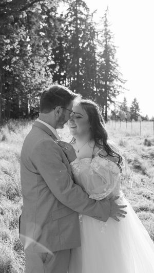 A romantic black and white wedding photo sequence shows a couple embracing in a sunlit outdoor field.
