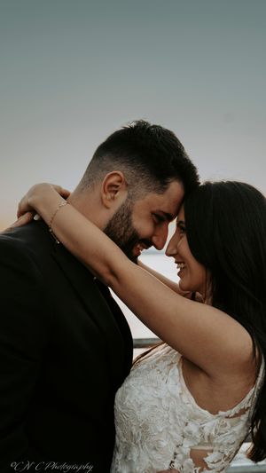 Romantic black and white wedding photography sequence showing intimate moments between newlyweds.