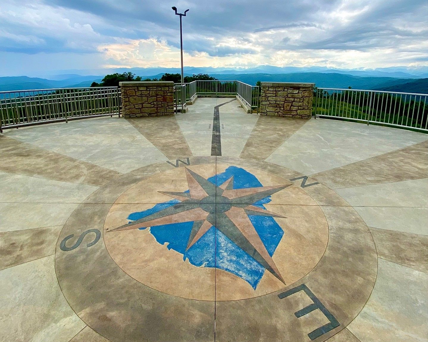 Sassafrass Mountain Overlook compass floor art straddles both North and South Carolina