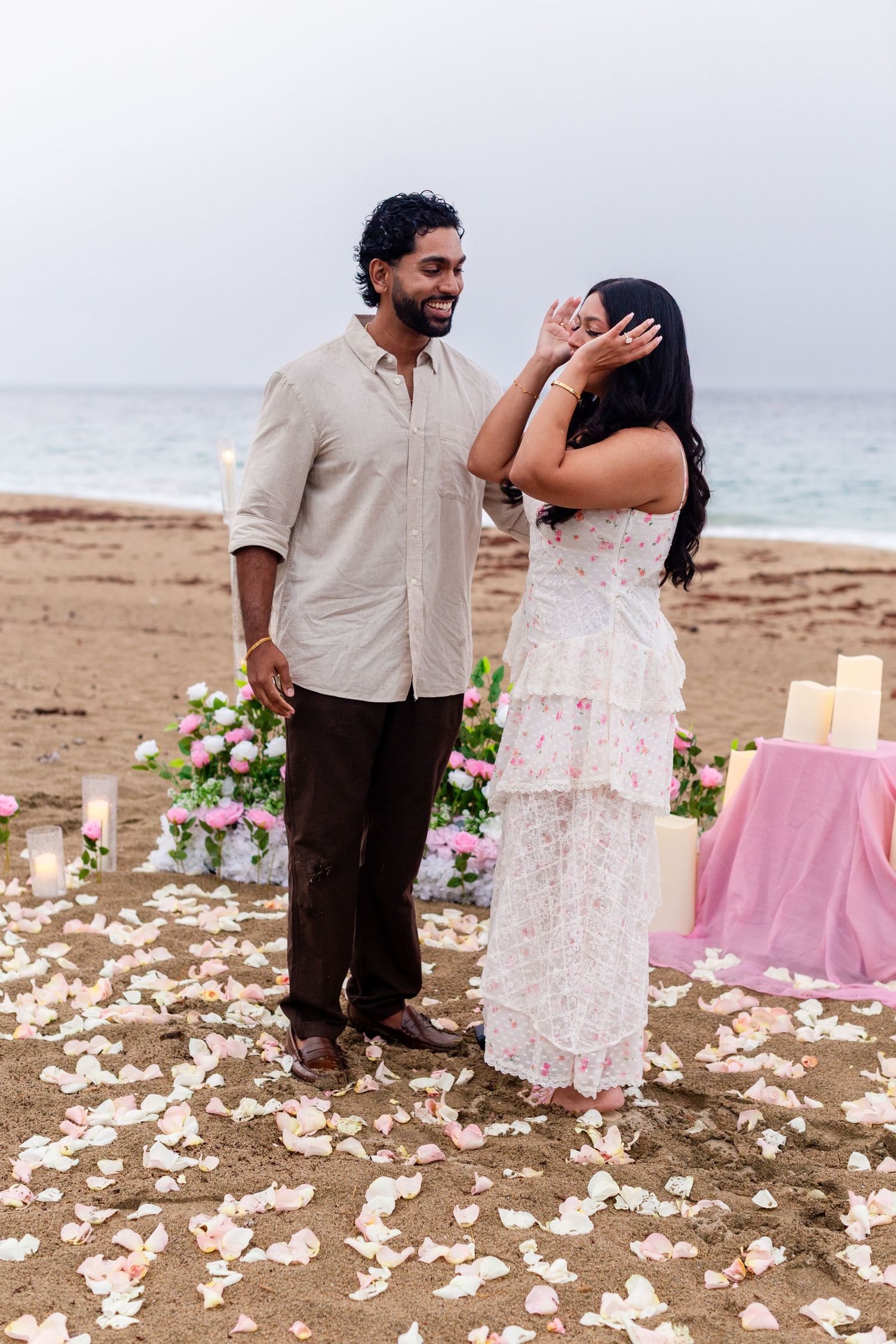 Marriage proposal on the beach with flowers and candles. Playa Guajataca, Isabela, Puerto Rico.