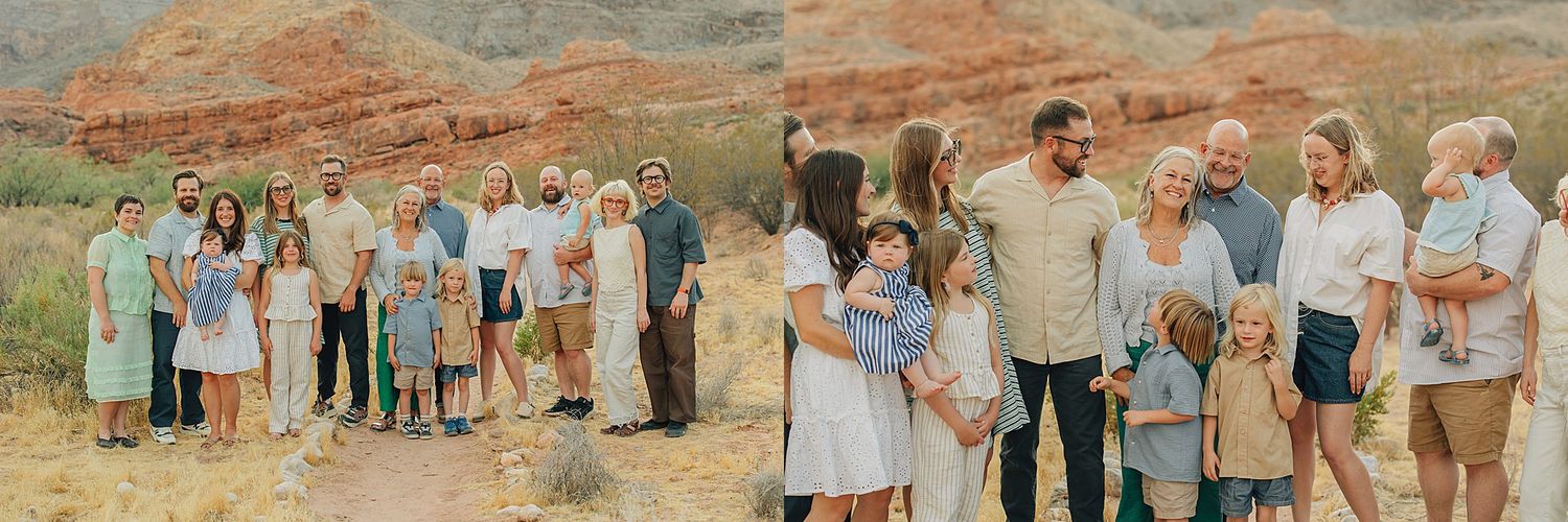Large family group portrait outdoors in red rock desert landscape, adults and children posing together in coordinated neutral outfits.
