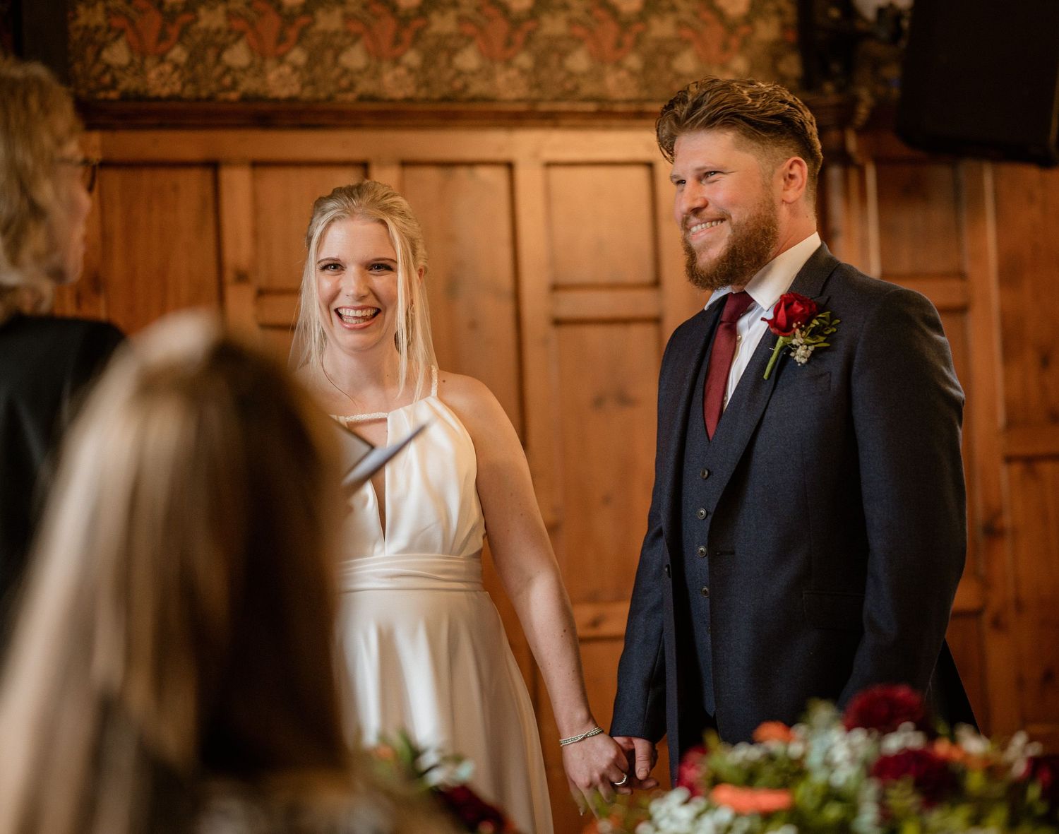 Jessica and Nick smiling during ceremony Worsley Court House