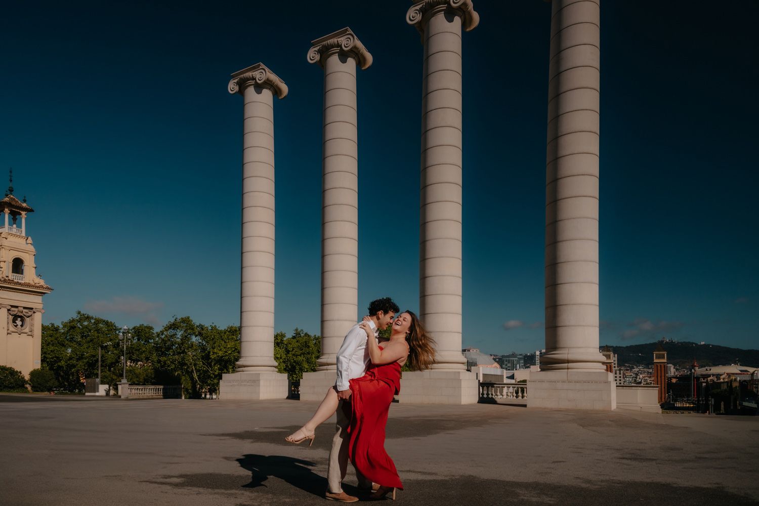 Feeling the fresh morning wind as you look at the city below. The view is huge, but you two feel close, cozy, and completely free.