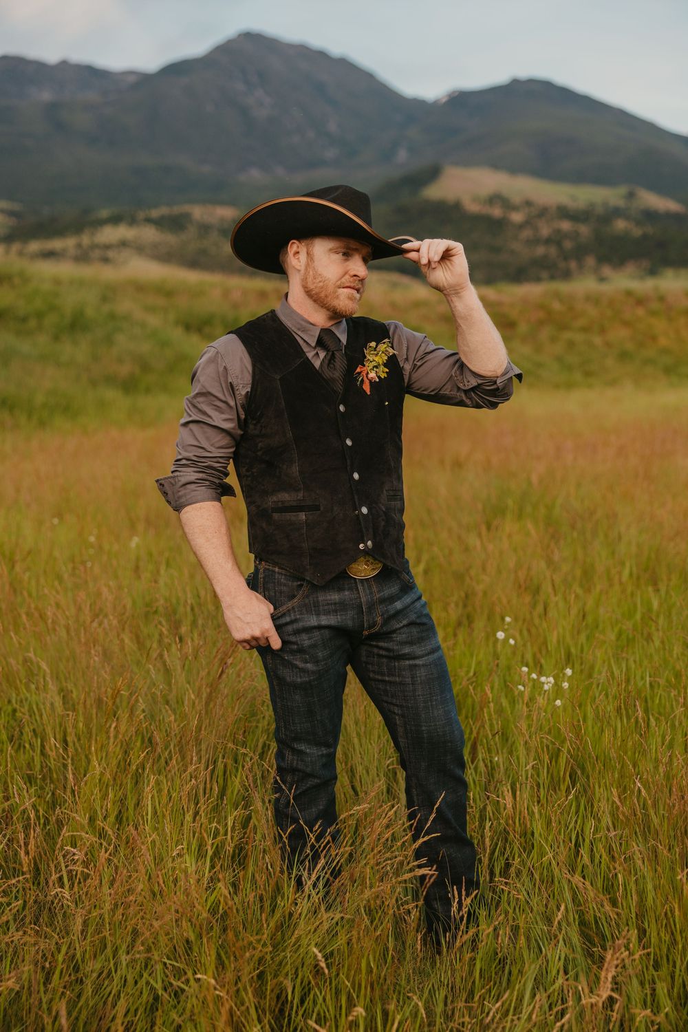 Cowboy groom cowboy hat at Copper Rose Ranch in Paradise Valley, in Pray, Montana by local Wedding Photographer Sabrina Marie
