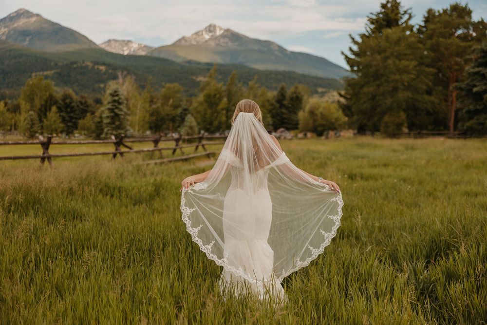 Bride dances under the Mountains in Paradise Valley at Copper Rose Ranch Captured by local Wedding Photographer from Livingston, Montana