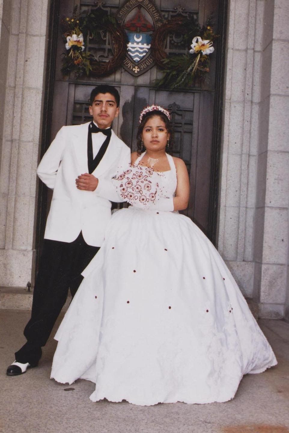 quinceañera posing in the early 2,000 at the Basilica of Saint Mary. chamberlain became a photographer.