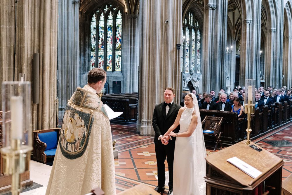 Couple exchanging vows at St Mary Redcliffe Church, Bristol Wedding