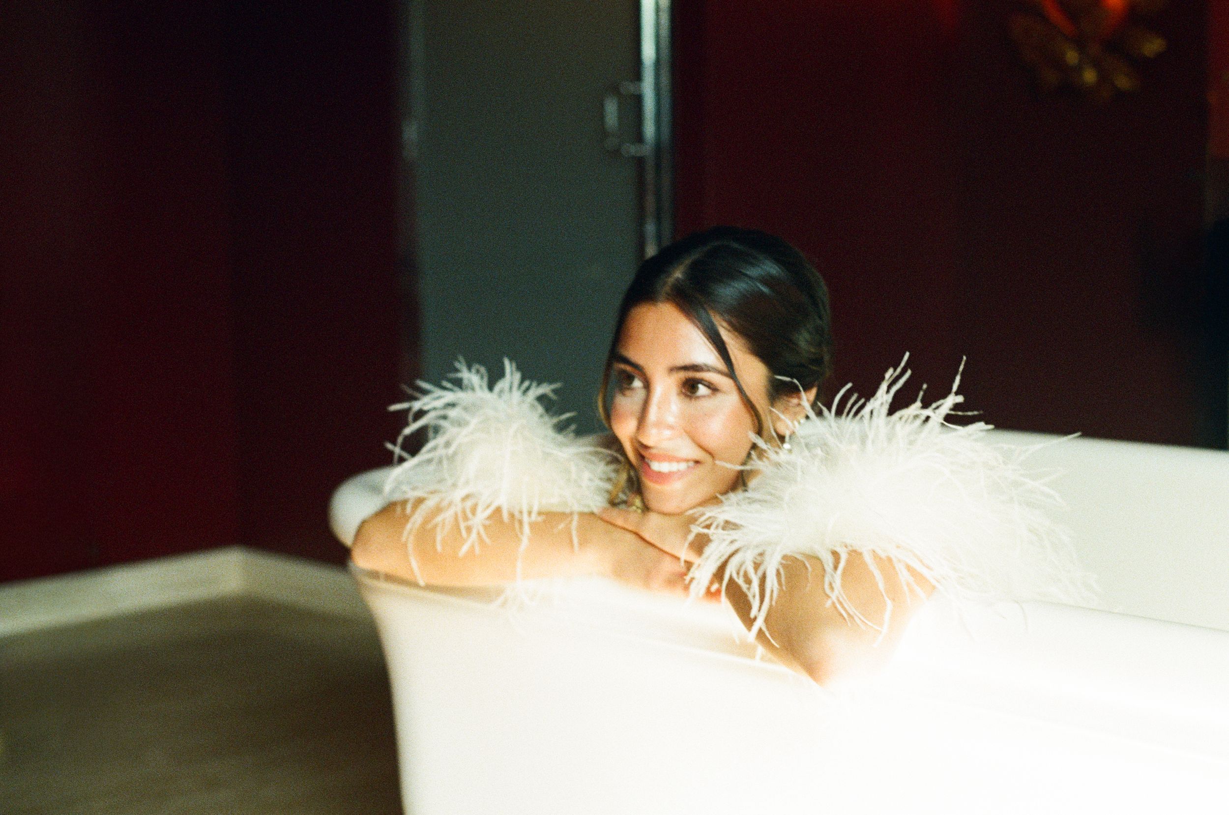 paris bride, paris wedding photographer, paris cinematic photographer, feather dress bride in bathtub, hotel particulier montmartre, film
