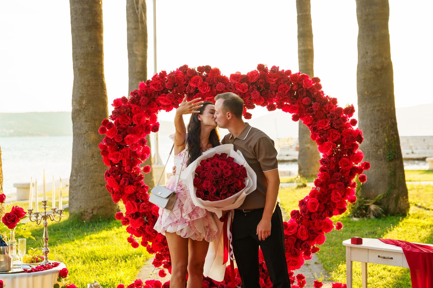 Luxury surprise proposal in Split, Croatia at sunset with romantic decorations and professional engagement photographer.