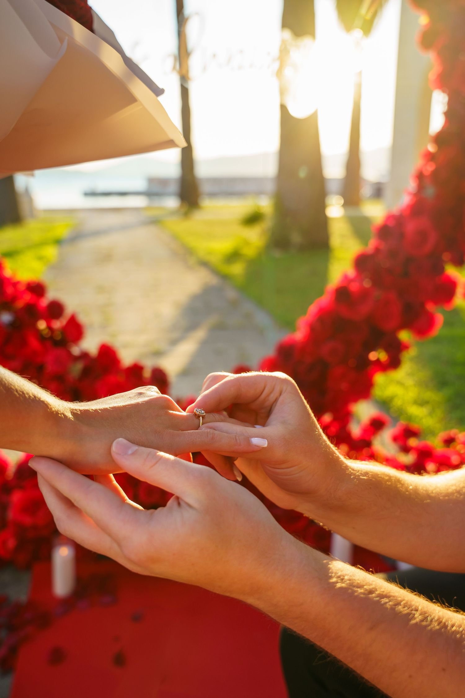 Luxury surprise proposal in Split, Croatia at sunset with romantic decorations and professional engagement photographer.