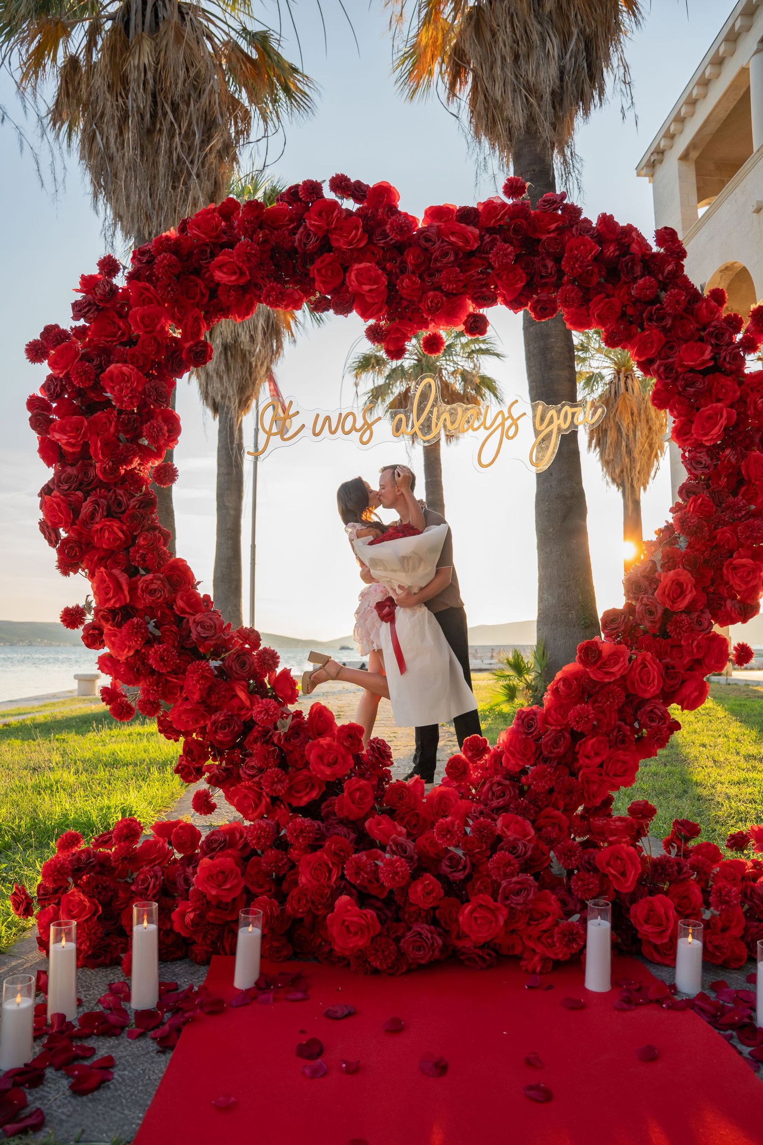 Luxury surprise proposal in Split, Croatia at sunset with romantic decorations and professional engagement photographer.