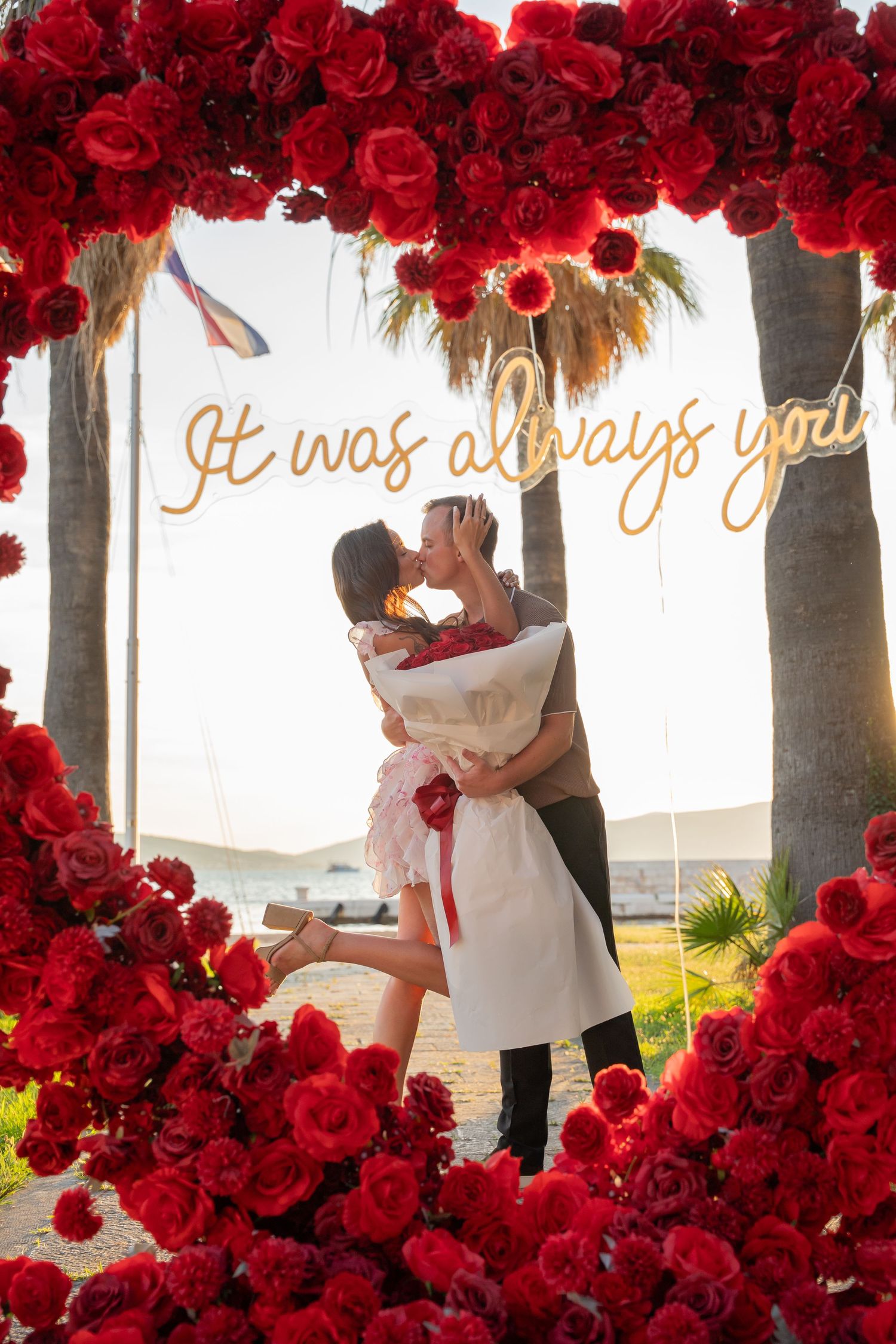Luxury surprise proposal in Split, Croatia at sunset with romantic decorations and professional engagement photographer.