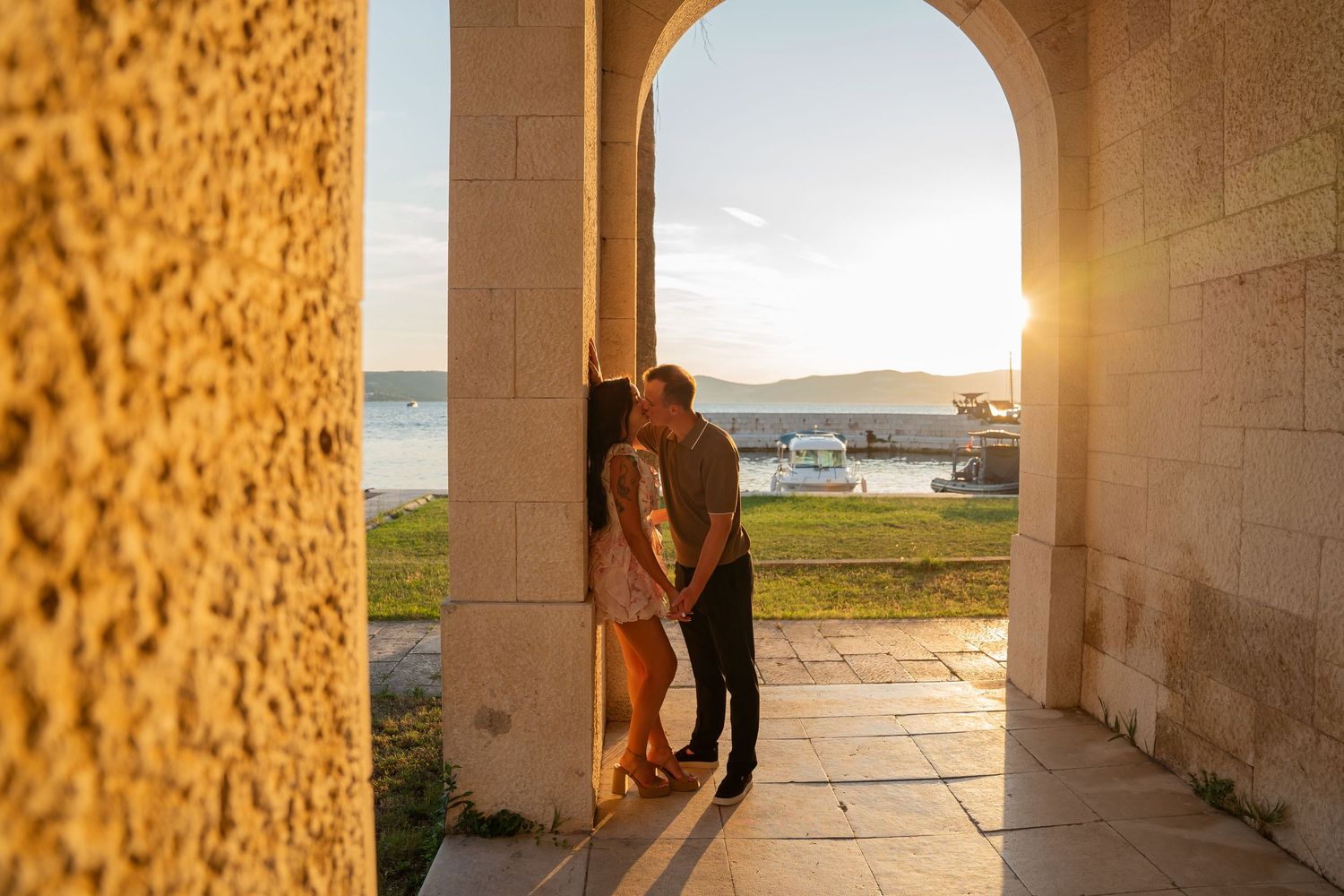 Luxury surprise proposal in Split, Croatia at sunset with romantic decorations and professional engagement photographer.