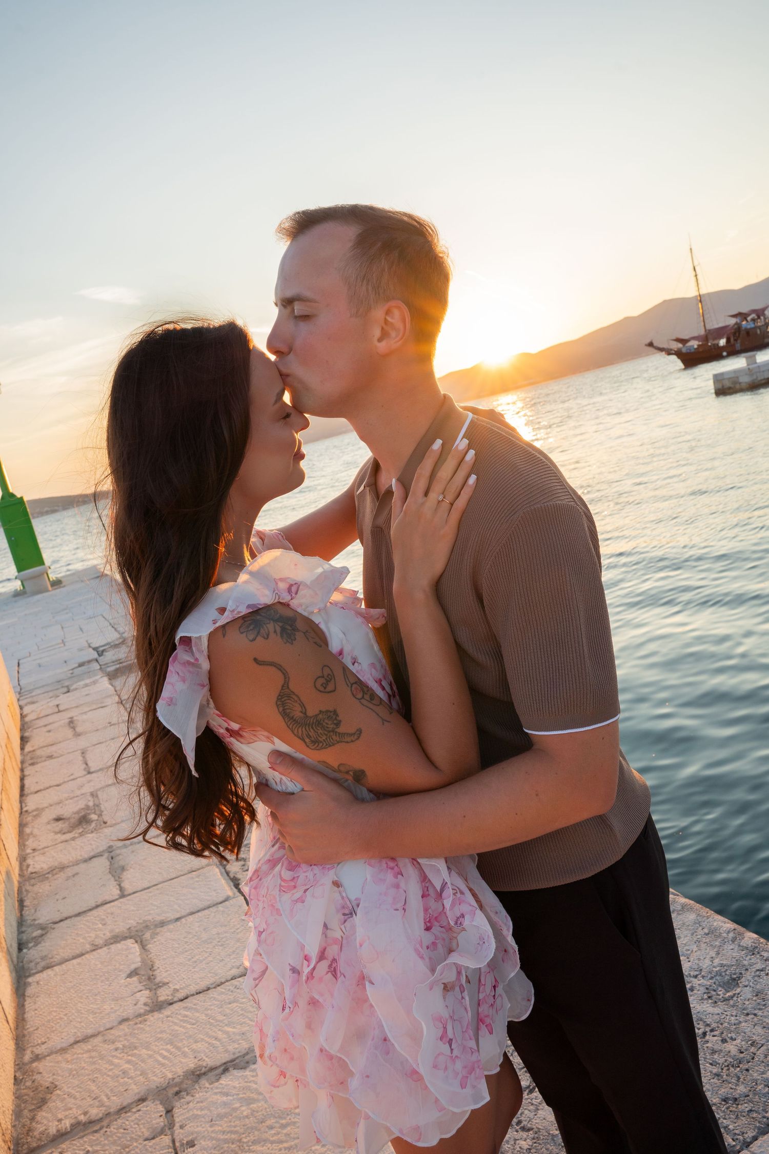 Luxury surprise proposal in Split, Croatia at sunset with romantic decorations and professional engagement photographer.
