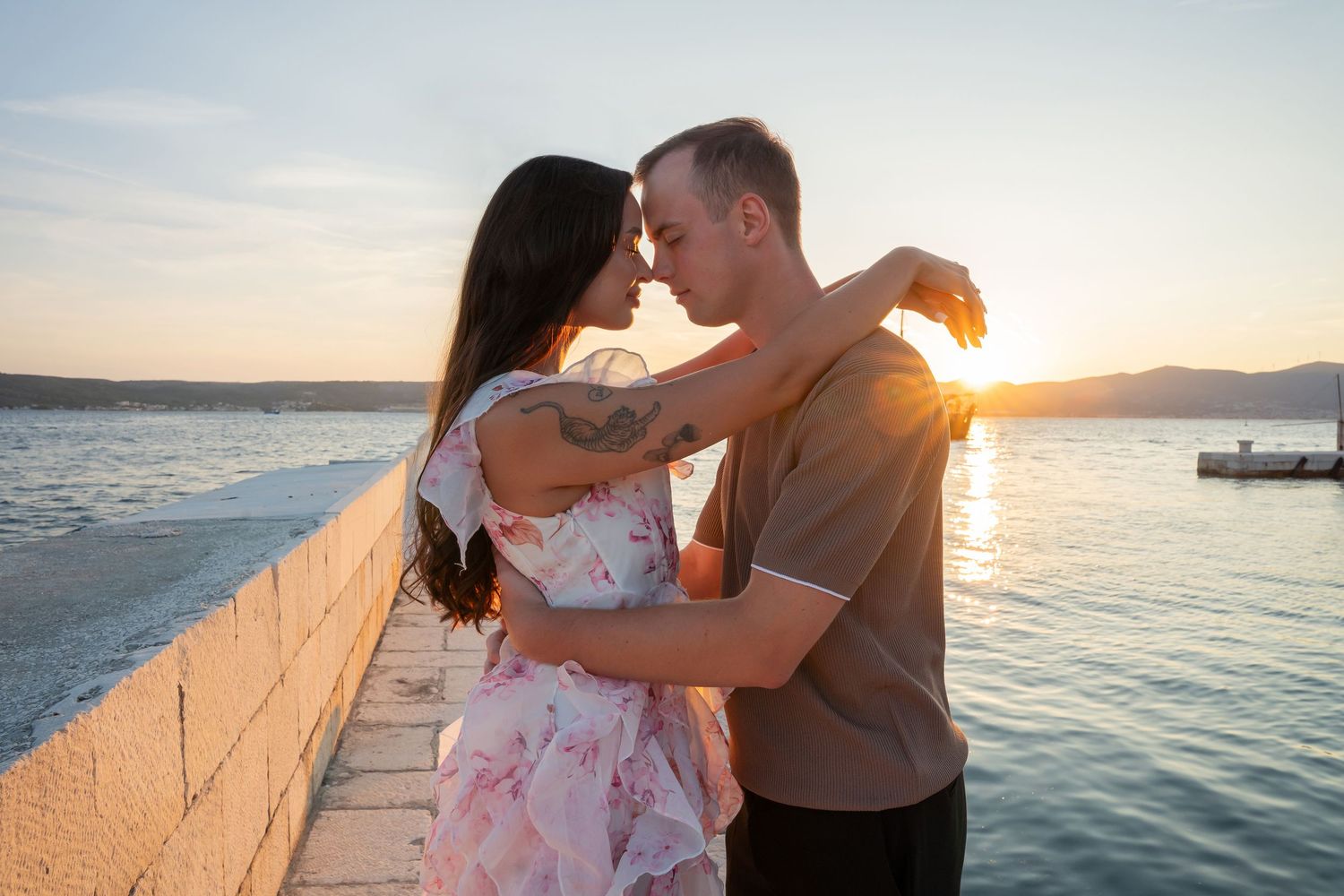 Luxury surprise proposal in Split, Croatia at sunset with romantic decorations and professional engagement photographer.