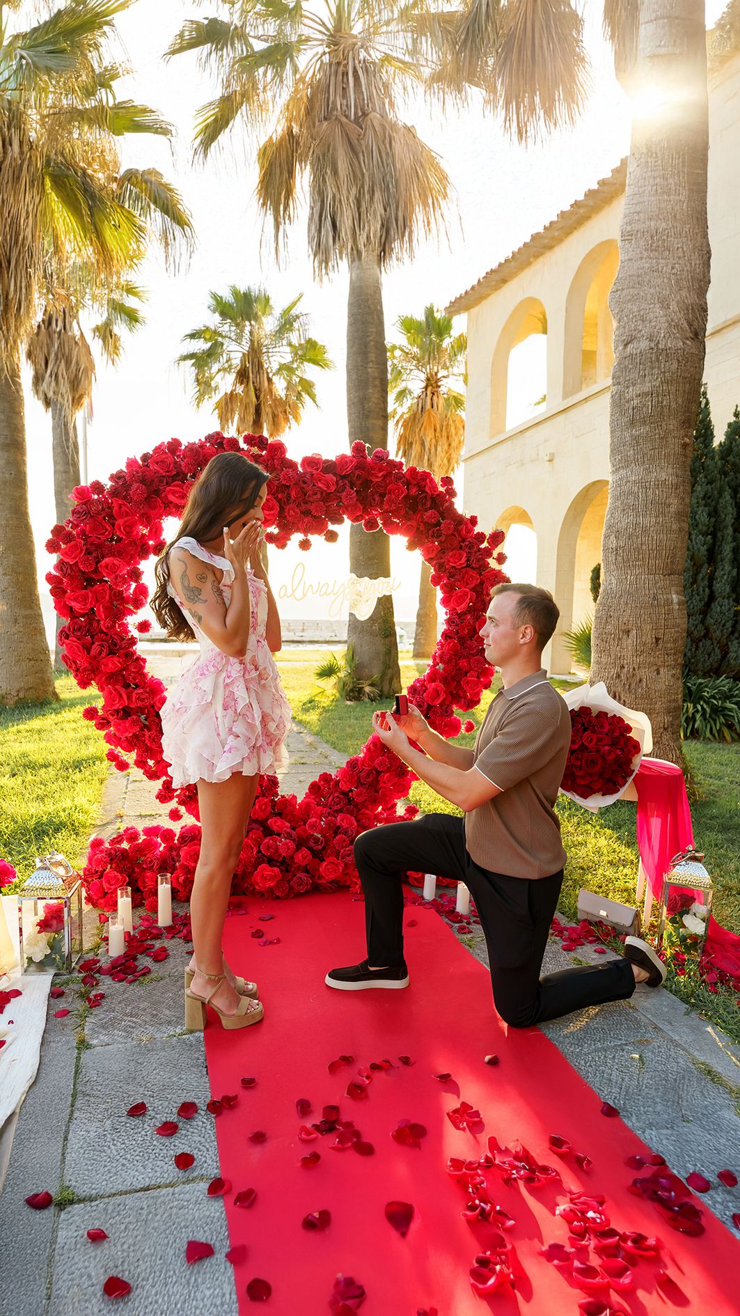 Luxury surprise proposal in Split, Croatia at sunset with romantic decorations and professional engagement photographer.