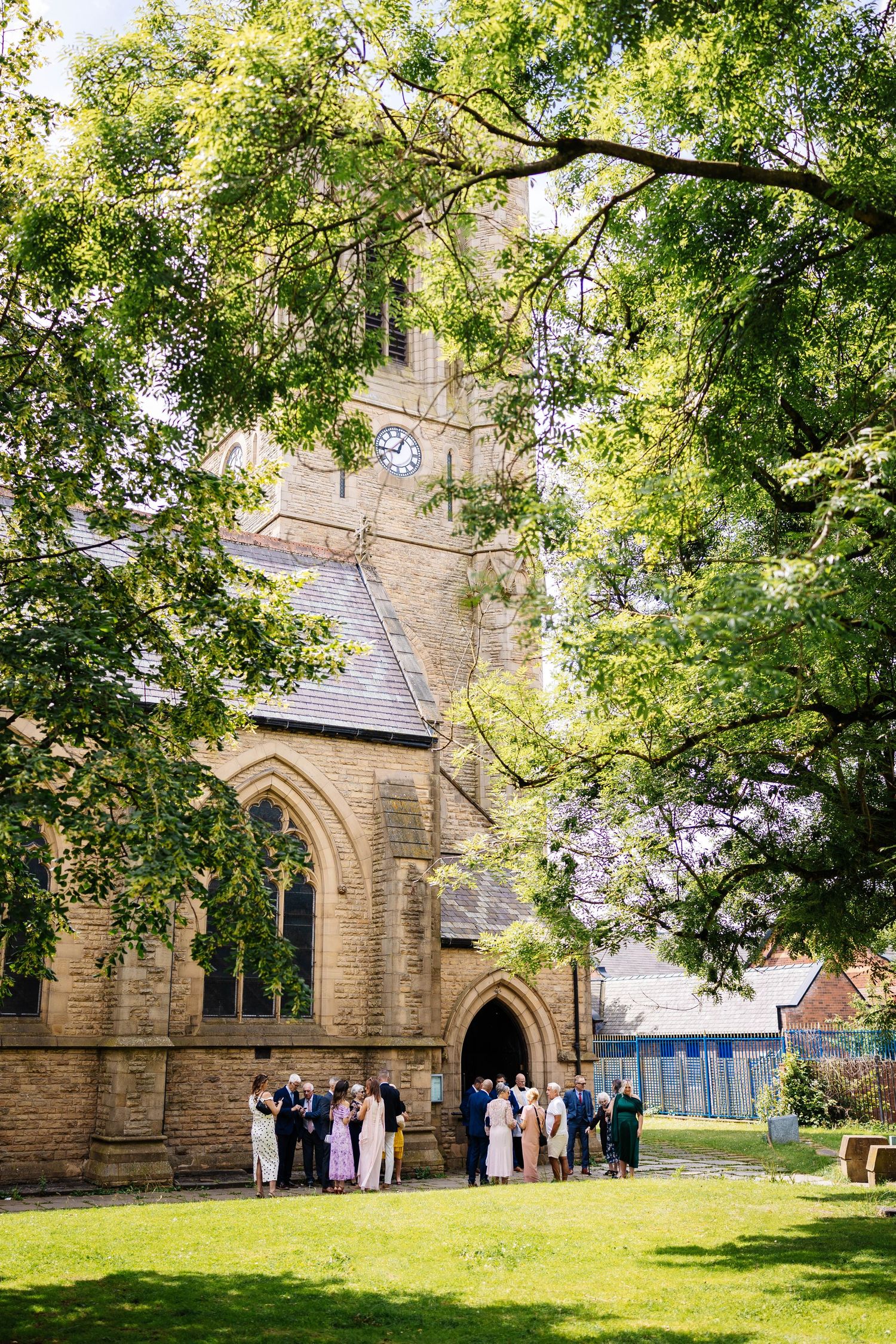 guests arriving at church in Worsley capture by Lynette Matthews Photography