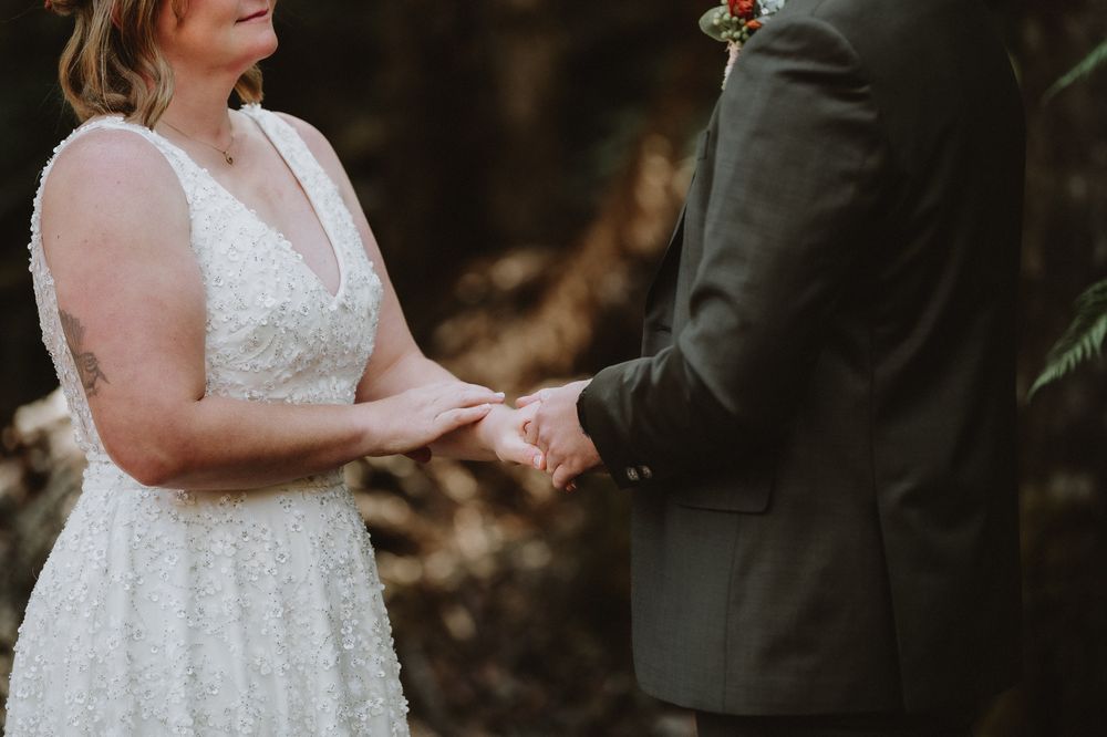 an intimate Forest ceremony in Tasmania during an adventure elopement on Hartz Mountain, captured by wedding photographer Joss Jensen
