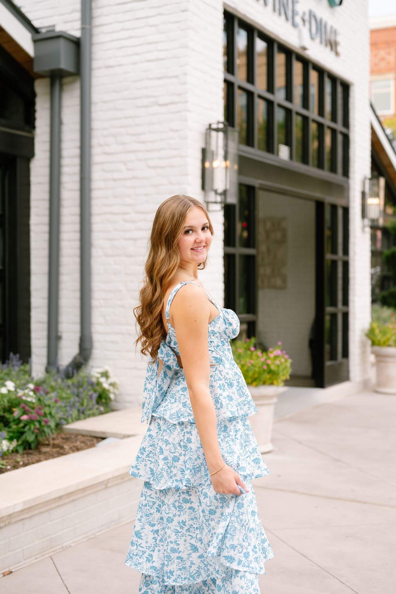 Oak Ridge high school senior girl posing at Market Street in The Woodlands Texas