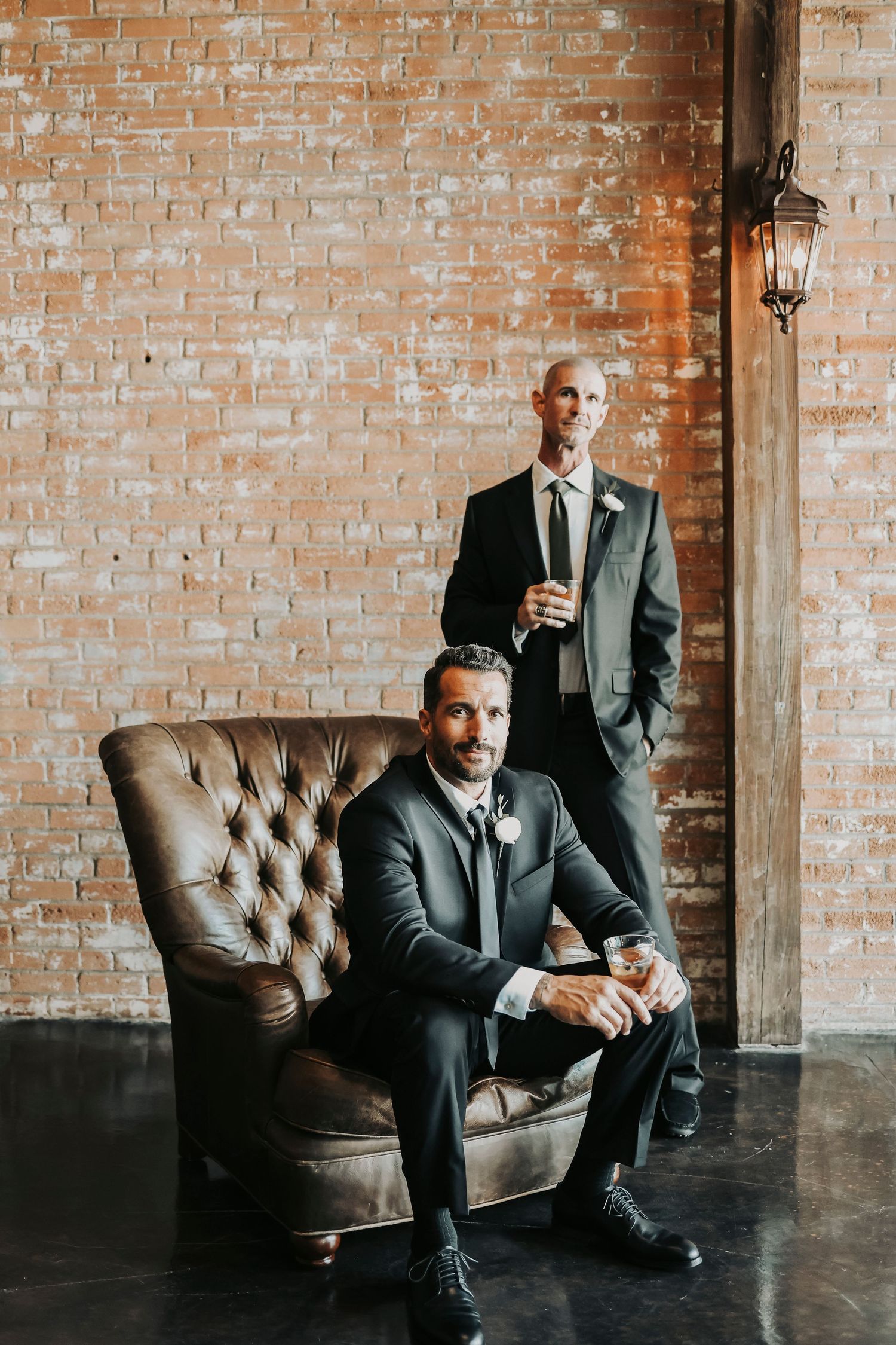 Joel Freeman posing for dramatic groom portraits in McKinney