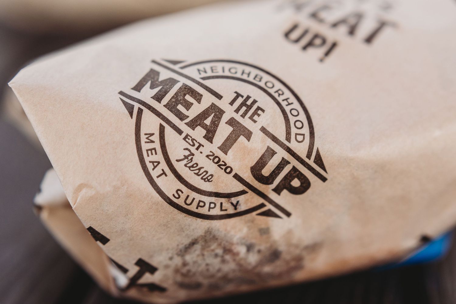 Sandwich in paper wrapper from The Meat Up