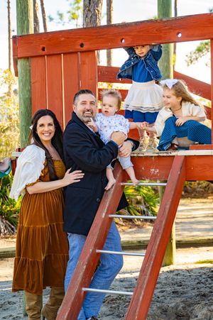 A series of candid family photos showing playful moments and interactions at an outdoor playground with wooden structures.