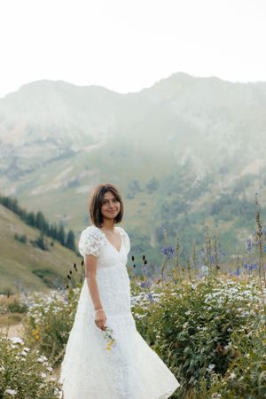 Girl Happy to Graduate in Utah and is a senior graduate. In the floral mountains