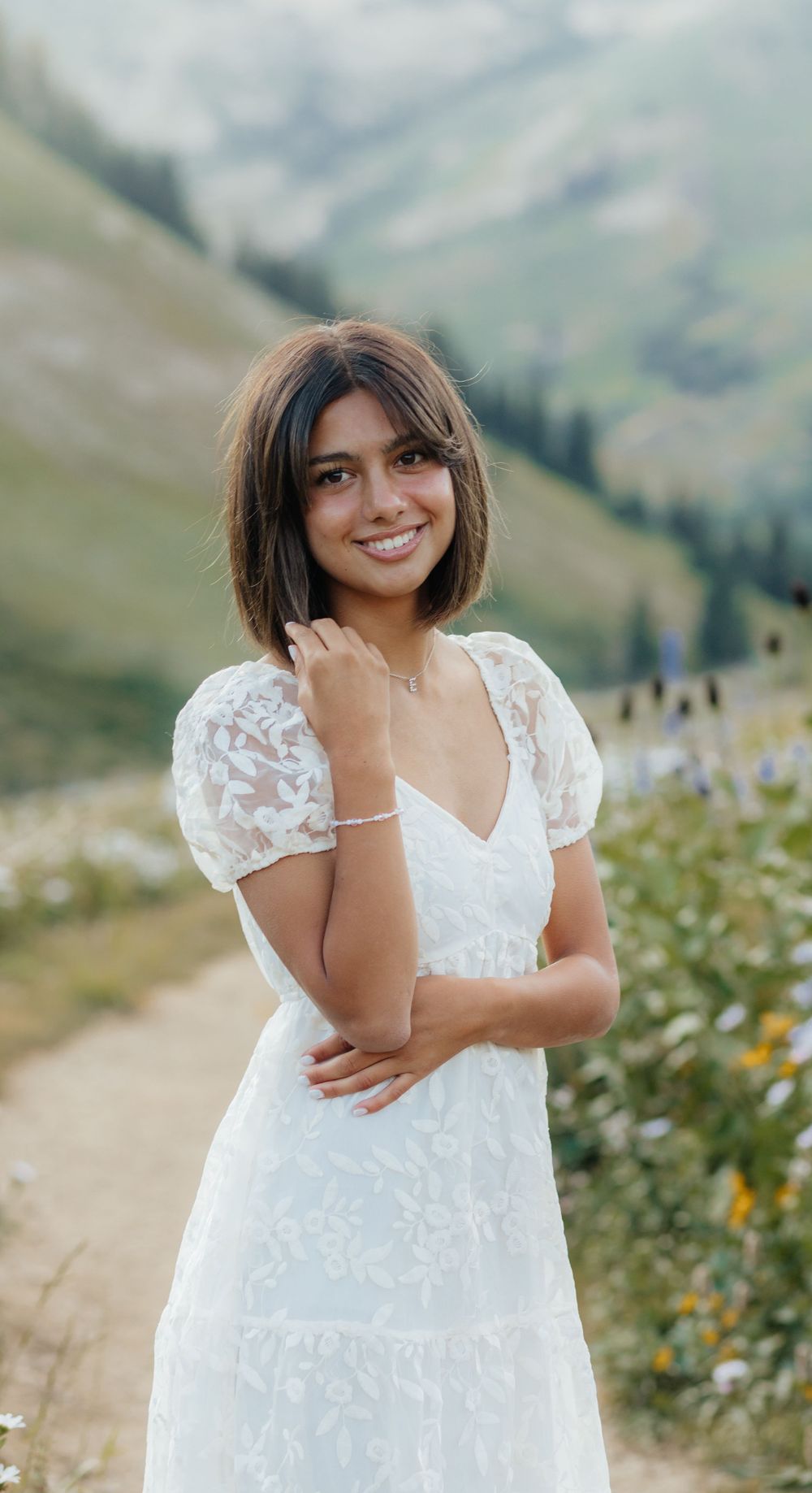 Girl Happy to Graduate in Utah and is a senior graduate. In the floral mountains