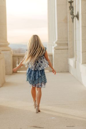 Girl Happy to Graduate in Utah and is a senior graduate. At the Utah State Capitol Building
