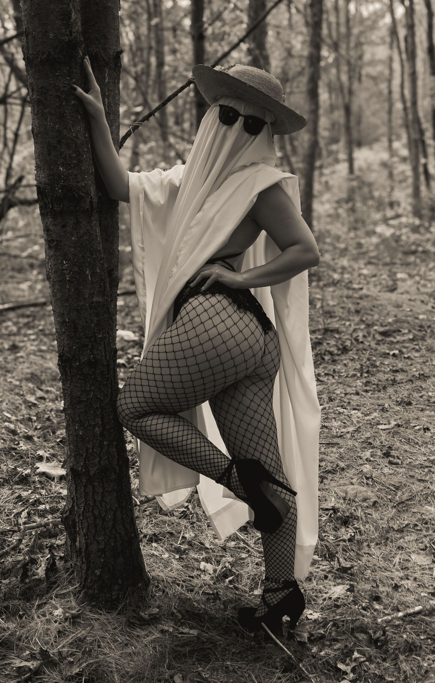 Sheet Ghost boudoir photoshoot concept of a Halloween theme taken at Deerfield Park in Smithfield, Rhode Island