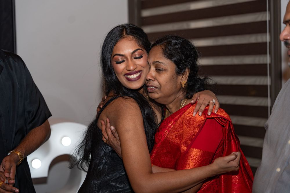 Joyful celebration moments captured between loved ones hugging and smiling.