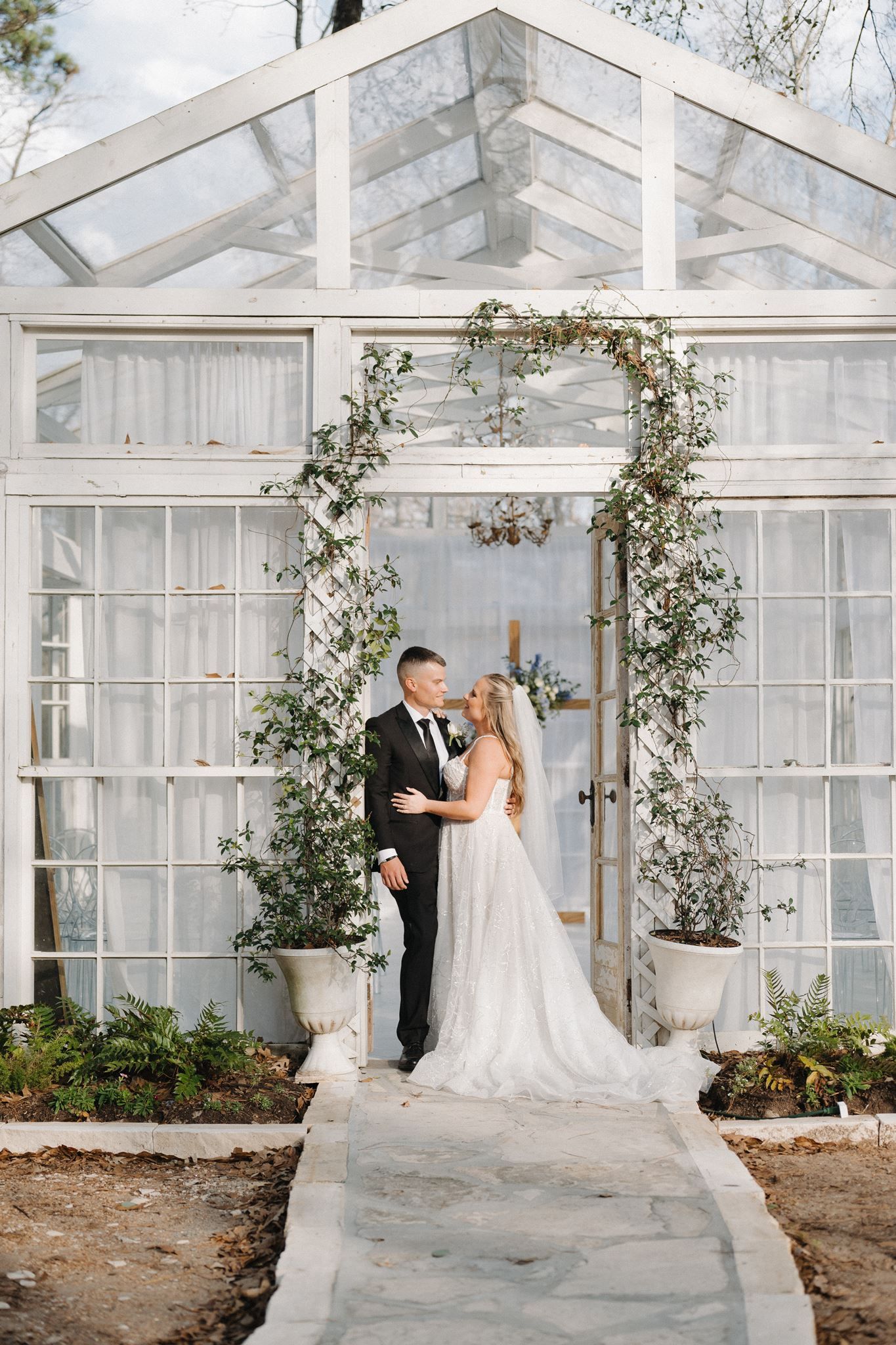 Bride and groom sharing an intimate moment after the mrico wedding at Oak Atelier in Conroe, Tx.