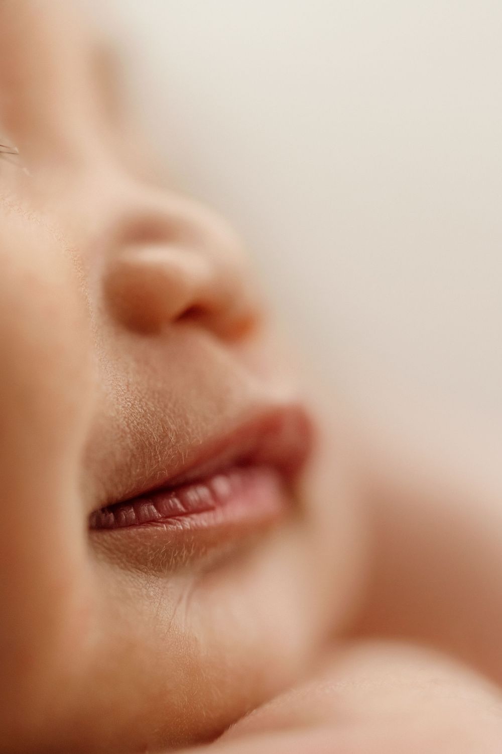 Close-up macro shots showing different angles of lips and skin in warm beige tones.