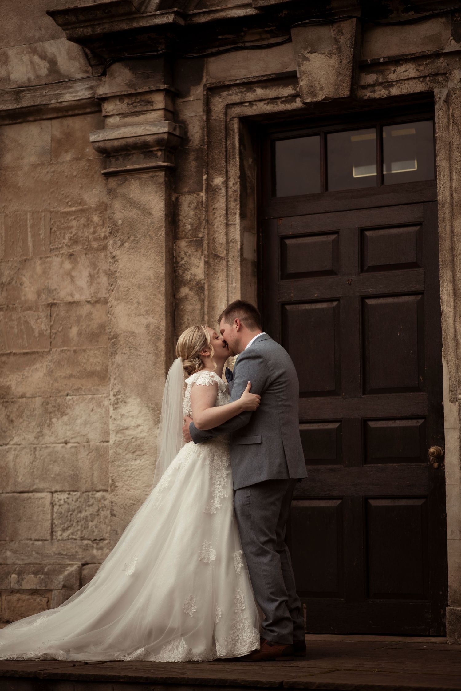 Intimate and emotional portrait of a bride and groom kissing. Yorkshire wedding photographer