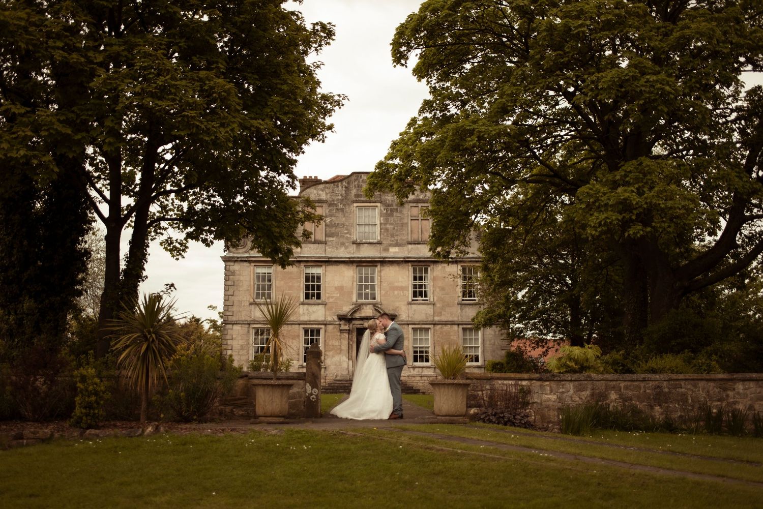 Intimate and emotional portrait of a bride and groom kissing. Yorkshire wedding photographer