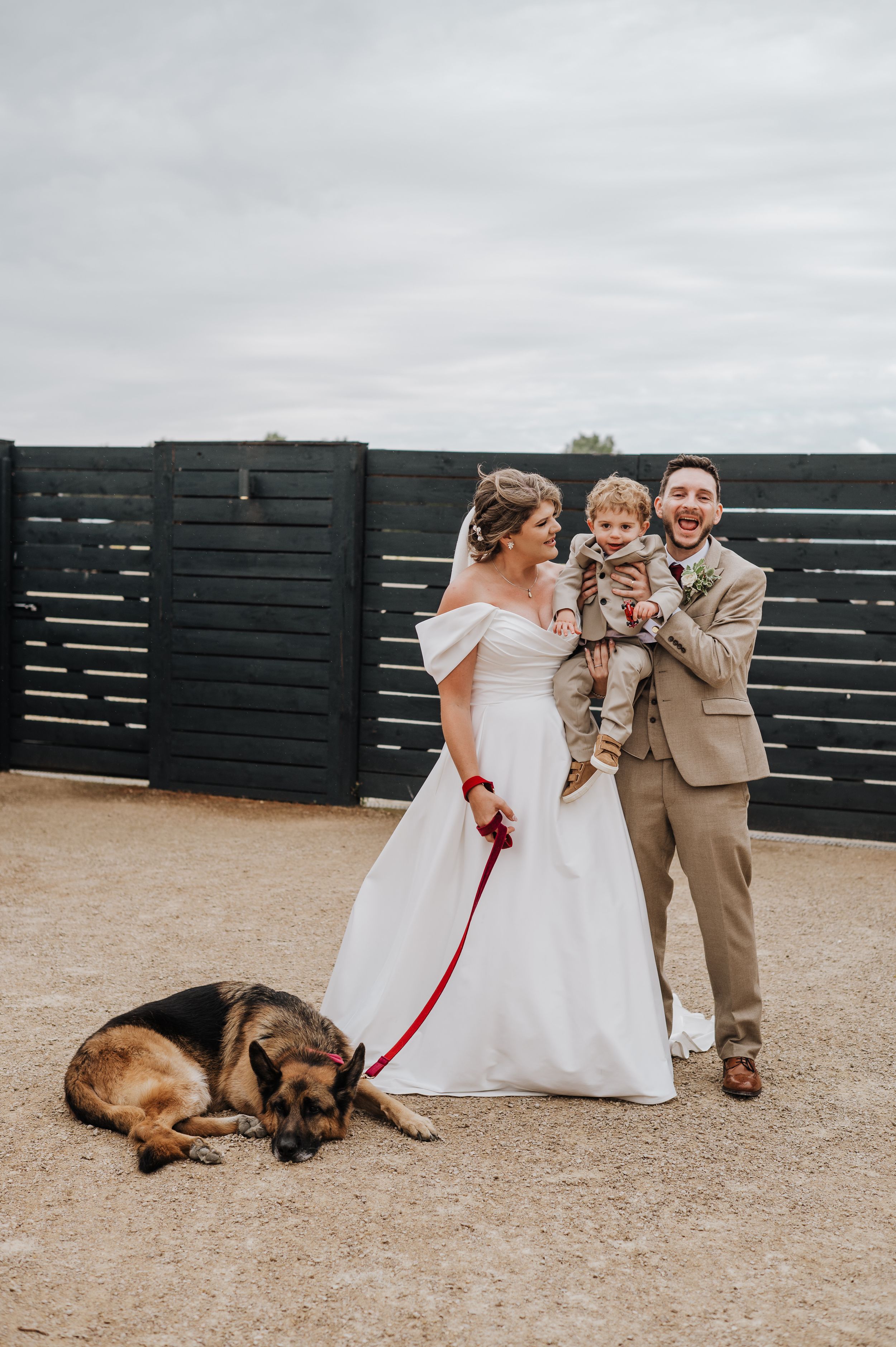 me with German shepherd kissing at the beach