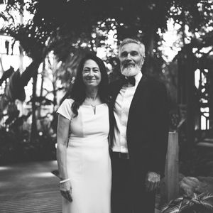 Black and white wedding photographs displayed in a filmstrip style showing outdoor ceremony moments.