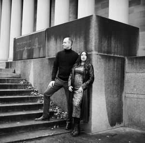 A series of black and white street photographs showing people sitting and leaning against urban architecture and stairs.