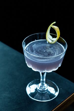 Black Orchid cocktail with lemon twist at Yardbird Spokane, photographed for Spokane Cocktail Week 2026