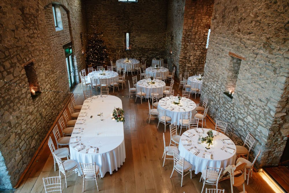 Priston Mill wedding photography Bath Somerset wedding breakfast room layout christmas