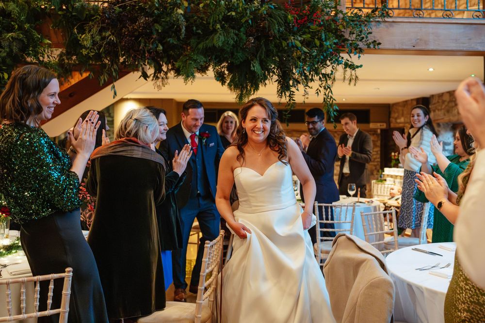 Priston Mill wedding photography Bath Somerset couple announced into wedding breakfast