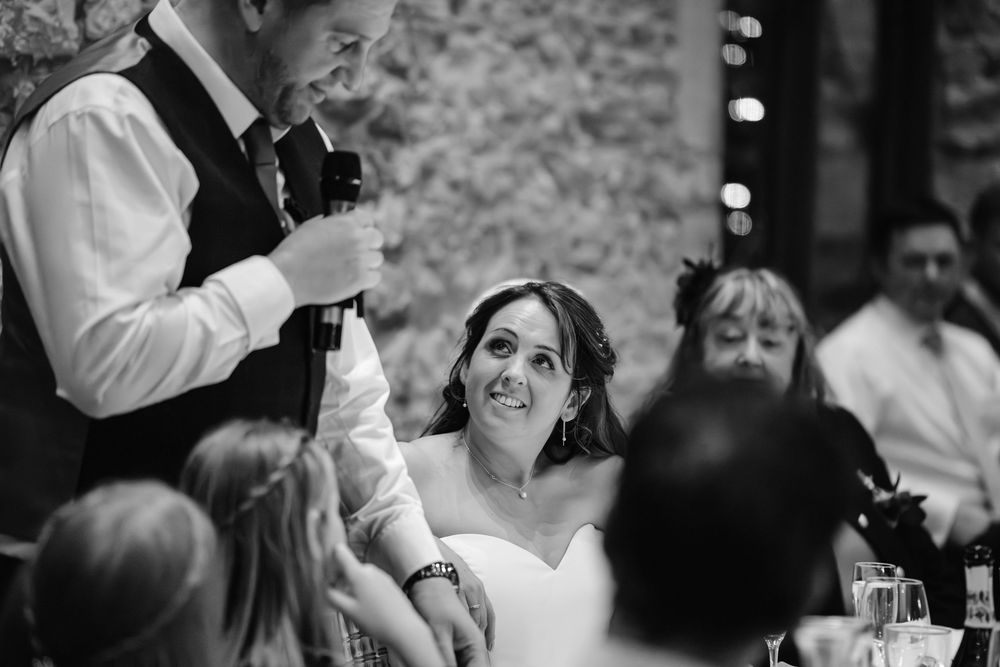 Priston Mill wedding photography Bath Somerset black and white of groom speeches