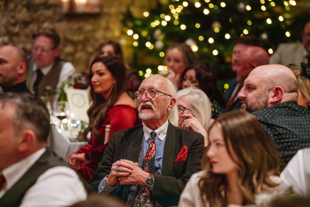 Priston Mill wedding photography Bath Somerset guests listening during speeches