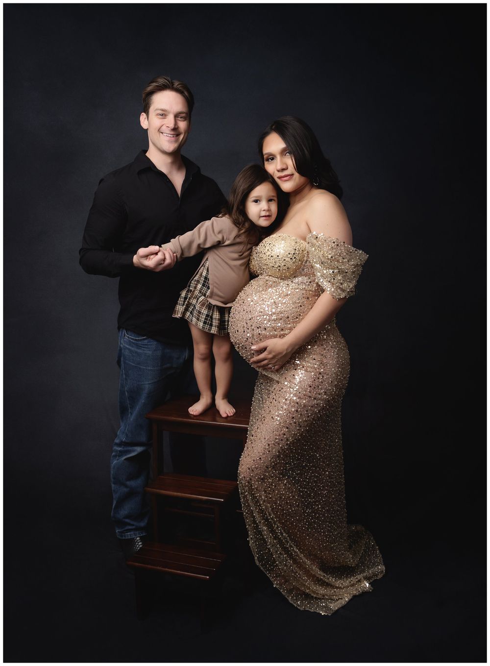 Couple maternity portrait session in studio featuring expectant parents photographed in Austin Texas
