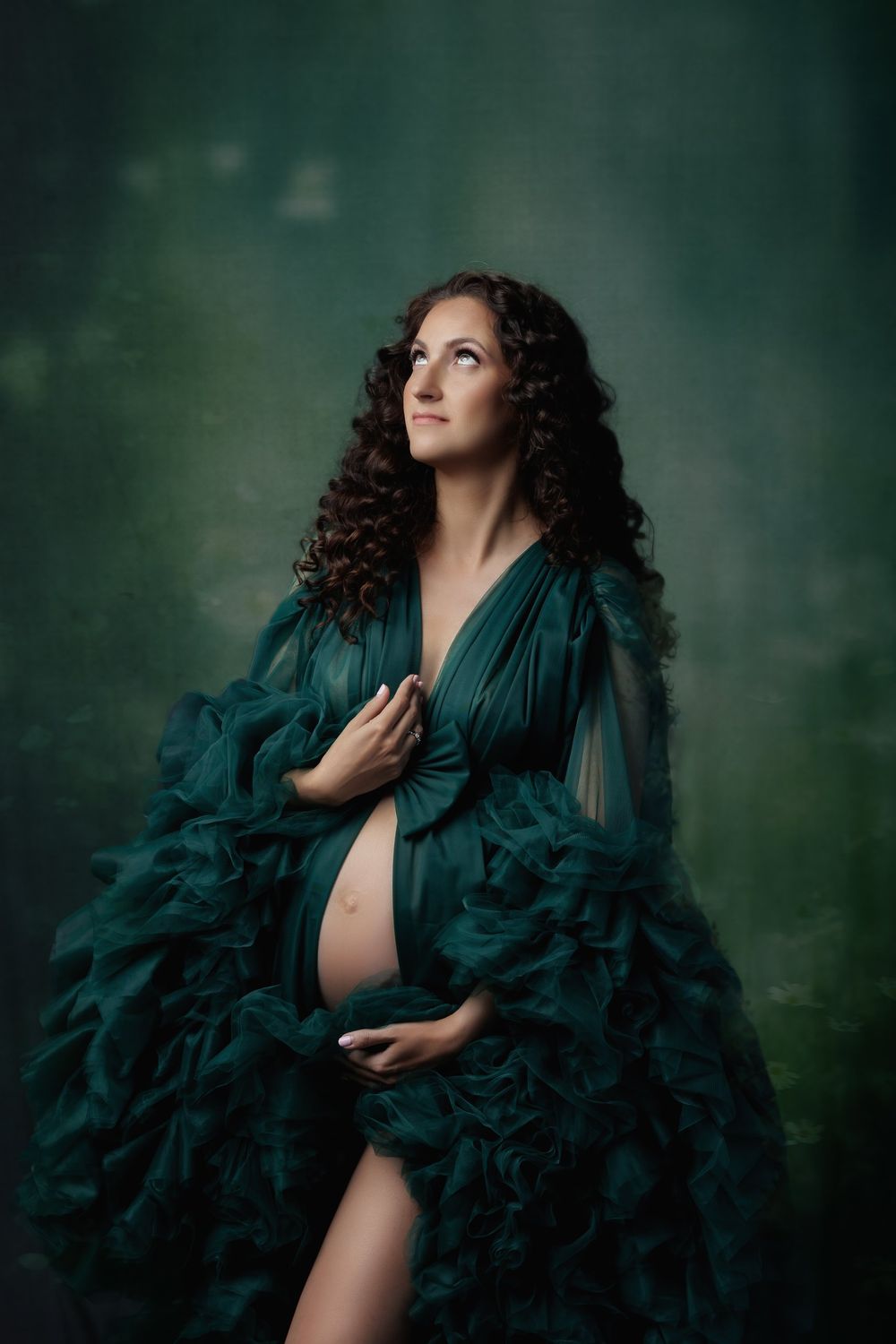 Elegant floral maternity portrait photographed in studio by Austin maternity photography studio