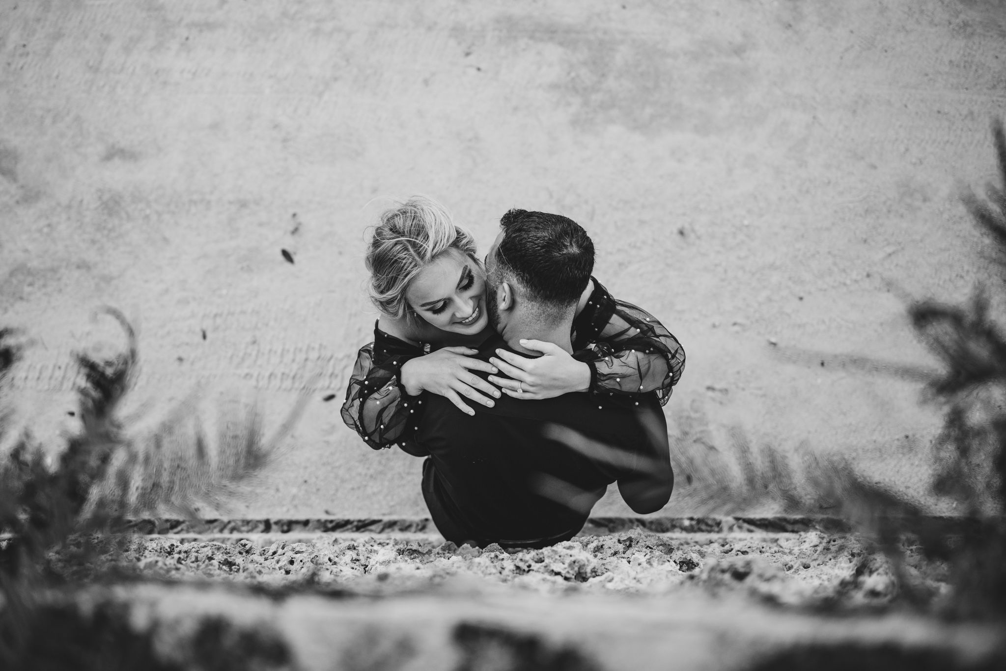 intimate pose from a unique from above angle for their engagement session at vizcaya house and gardens