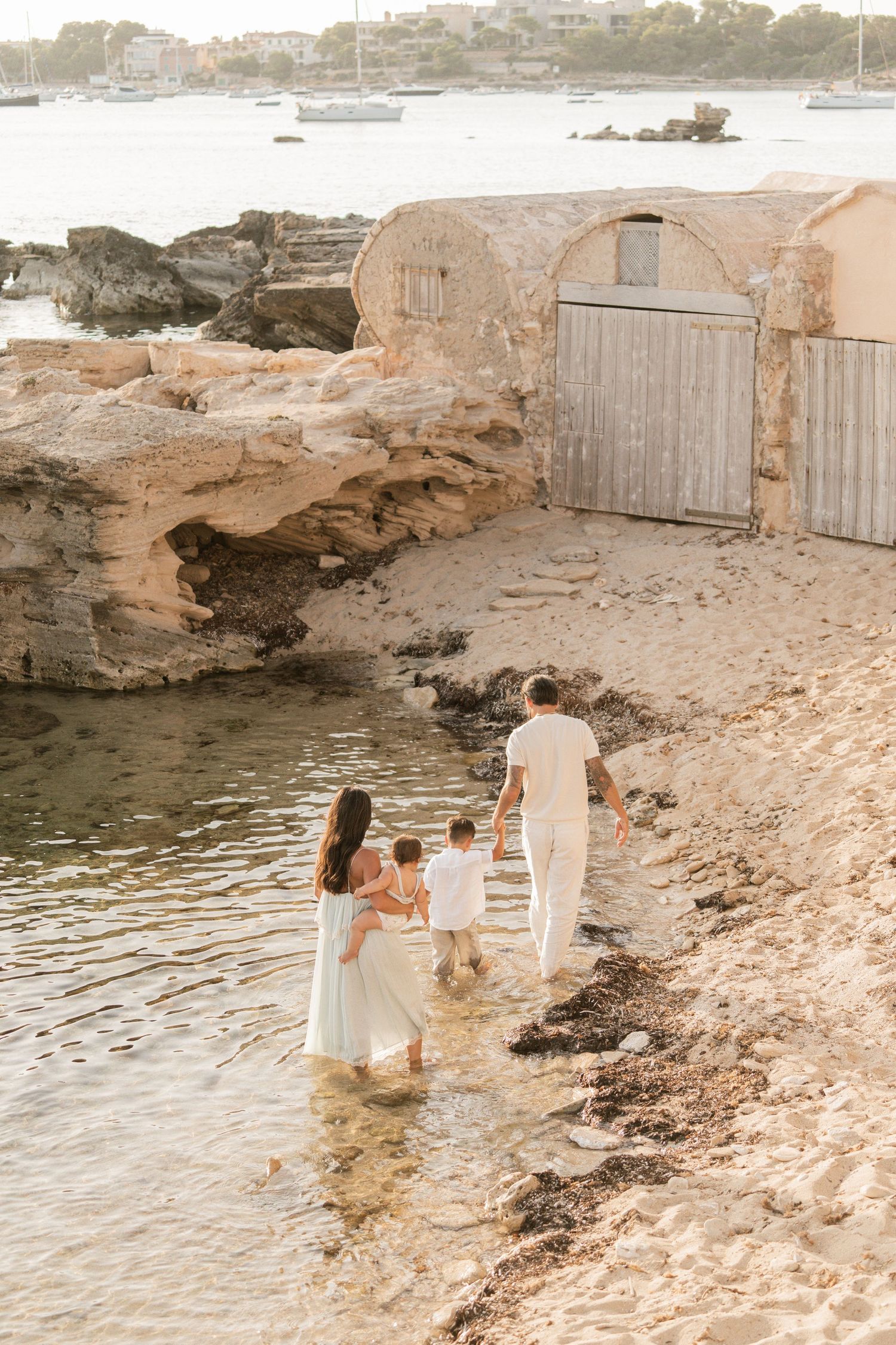 A family enjoying their time on the beach in Mallorca in Colonia de Sant Jordie.