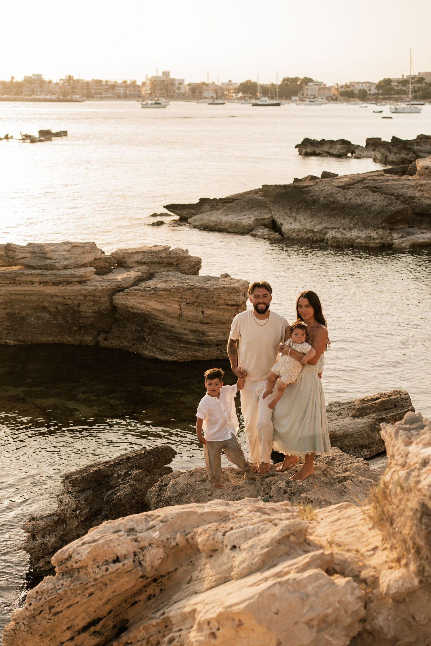 A family enjoying their time on the beach in Mallorca in Colonia de Sant Jordie.