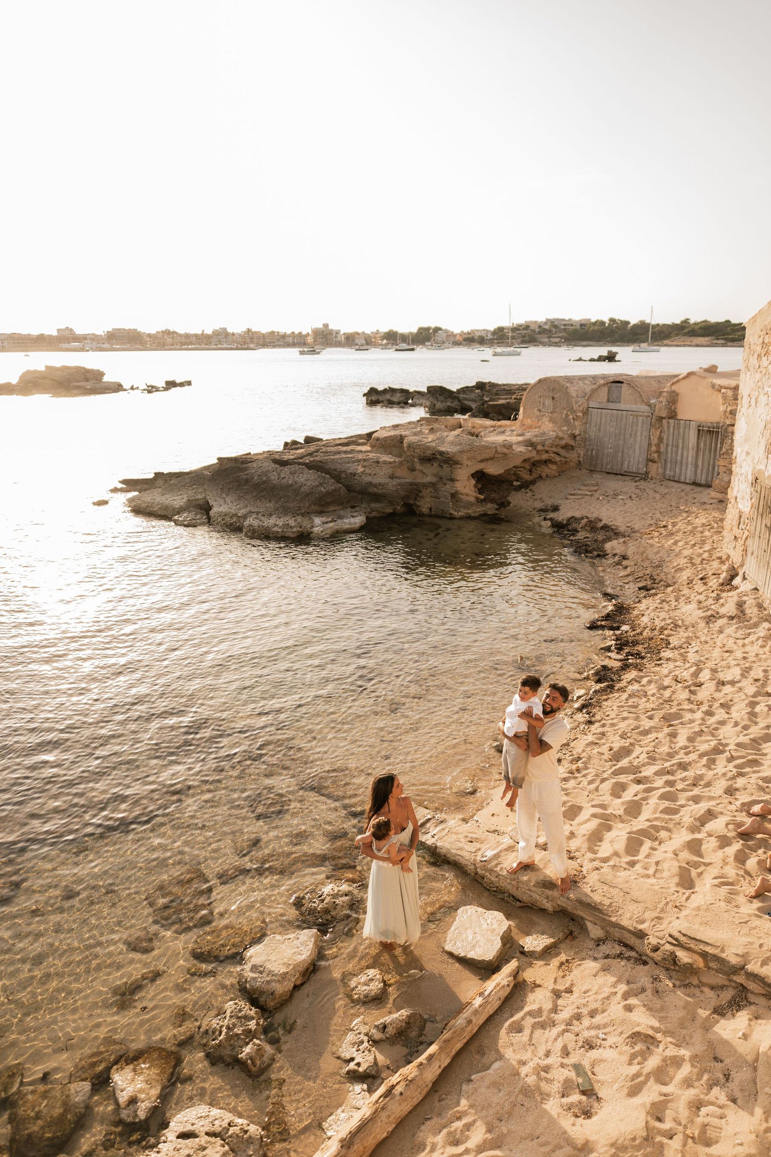 A family enjoying their time on the beach in Mallorca in Colonia de Sant Jordie.