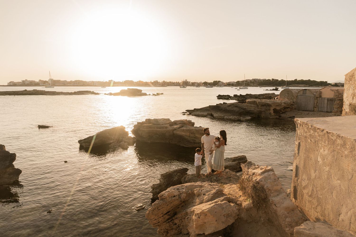 A family enjoying their time on the beach in Mallorca in Colonia de Sant Jordie.